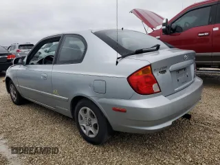 2005 Hyundai Accent GLS with VIN KMHCG35C75U354574, listed as a Copart auction lot 74931444 with 141,013 mi miles and Salvage Title. Bid and sale history available at carsss.com. Image 2.