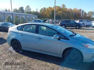 2015 Toyota Prius Four with VIN JTDKN3DU6F1891116, listed as a IAAI auction lot 40689158 with 210,876 mi miles. Bid and sale history available at carsss.com. Image 1.