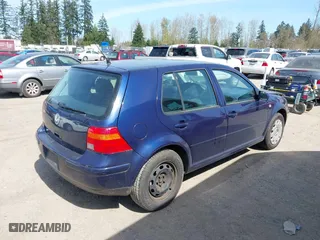 2003 Volkswagen Golf GL with VIN 9BWFK61J334061151, listed as a IAAI auction lot 41963428 with 148,052 mi miles. Bid and sale history available at carsss.com. Image 4.
