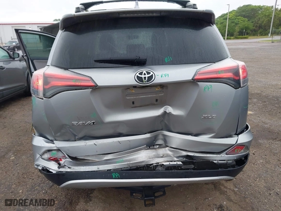 2016 Toyota RAV4 XLE with VIN 2T3WFREV5GW309468, listed as a IAAI auction lot 41973896 with 100,911 mi miles. Bid and sale history available at carsss.com. Image 6.