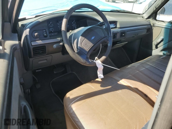1992 Ford F-150 with VIN 1FTDF15Y4NLA94328, listed as a Copart auction lot 51690965 with 191,656 mi miles and Salvage Title. Bid and sale history available at carsss.com. Image 8.