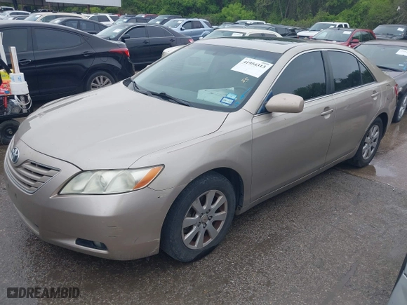 2008 Toyota Camry LE with VIN 4T1BK46KX8U574706, listed as a IAAI auction lot 41954313 with 217,899 mi miles. Bid and sale history available at carsss.com. Image 2.