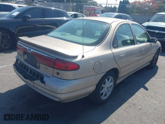 1999 Ford Contour z VIN 3FAFP66L6XM102099, wystawiony jako IAAI lot #42161889 z przebiegiem 100 340 mil mil oraz . Historia ofert i sprzedaży dostępna na DreamBid. Obrazek 4.