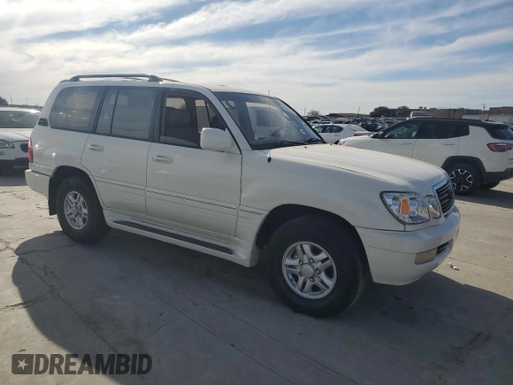 2002 Lexus LX 470 z VIN JTJHT00W623514108, wystawiony jako Copart lot #88704265 z przebiegiem Nie podano mil oraz Tytuł czysty. Historia ofert i sprzedaży dostępna na DreamBid. Obrazek 4.