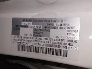 2018 Mazda 3 Touring z VIN 3MZBN1V32JM188650, wystawiony jako IAAI lot #41428819 z przebiegiem 225 611 mil mil oraz . Historia ofert i sprzedaży dostępna na DreamBid. Obrazek 9.