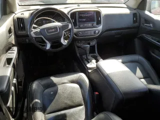 2018 GMC Canyon 4WD SLT with VIN 1GTP6DE16J1136652, listed as a Copart auction lot 45776315 with 138,469 mi miles and Salvage Title. Bid and sale history available at DreamBid. Image 8.