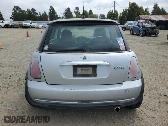 2005 MINI Hardtop with VIN WMWRC335X5TJ70165, listed as a Copart auction lot 53918445 with 145,572 mi miles and Salvage title. Bid and sale history available at DreamBid. Image 6.