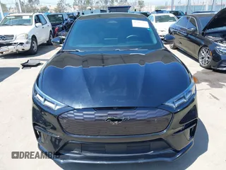 2023 Ford Mustang Mach-E GT z VIN 3FMTK4SX5PMA06095, wystawiony jako IAAI lot #42203596 z przebiegiem 27 664 mil mil oraz . Historia ofert i sprzedaży dostępna na DreamBid. Obrazek 12.