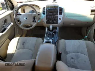 2006 Mercury Mariner Hybrid z VIN 4M2CU98H26KJ20650, wystawiony jako Copart lot #57728915 z przebiegiem 178 130 mil mil oraz Szkoda całkowita • Salvage title. Historia ofert i sprzedaży dostępna na DreamBid. Obrazek 8.