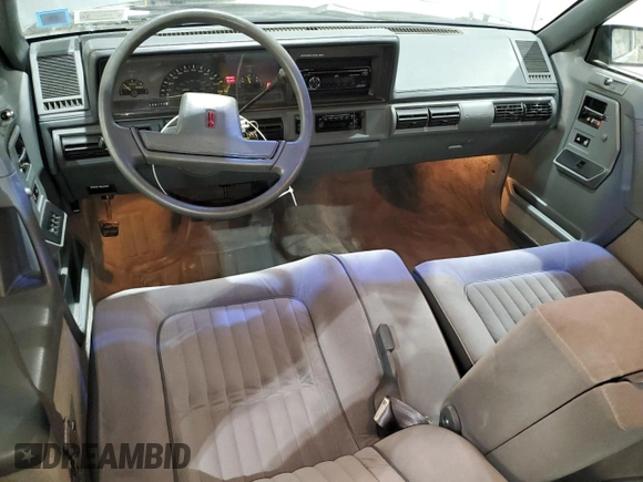 1991 Oldsmobile Cutlass Ciera with VIN 2G3AM54N8M2304905, listed as a Copart auction lot 52047535 with 28,749 mi miles and Salvage Title. Bid and sale history available at DreamBid. Image 8.