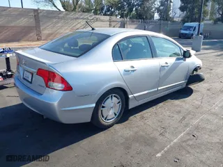 2010 Honda Civic Hybrid with VIN JHMFA3F24AS000539, listed as a IAAI auction lot 41993379 with 1 mi miles. Bid and sale history available at carsss.com. Image 4.