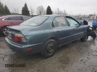 1996 Honda Accord Value with VIN 1HGCD5693TA266021, listed as a Copart auction lot 86699844 with 237,152 mi miles and Salvage Title. Bid and sale history available at DreamBid. Image 3.