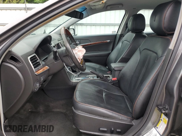 2012 Lincoln MKZ Hybrid with VIN 3LNDL2L30CR825059, listed as a Copart auction lot 56988625 with 143,644 mi miles and Clean title. Bid and sale history available at DreamBid. Image 7.