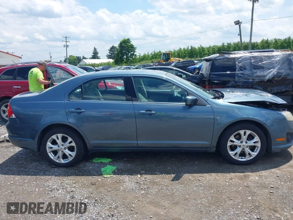 2012 Ford Fusion SE with VIN 3FAHP0HAXCR190170, listed as a IAAI auction lot 42641299 with 180,760 mi miles and . Bid and sale history available at DreamBid. Image 13.