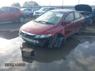 2010 Honda Civic LX z VIN 19XFA1F51AE012859, wystawiony jako IAAI lot #41770782 z przebiegiem 114 938 mil mil oraz . Historia ofert i sprzedaży dostępna na DreamBid. Obrazek 6.