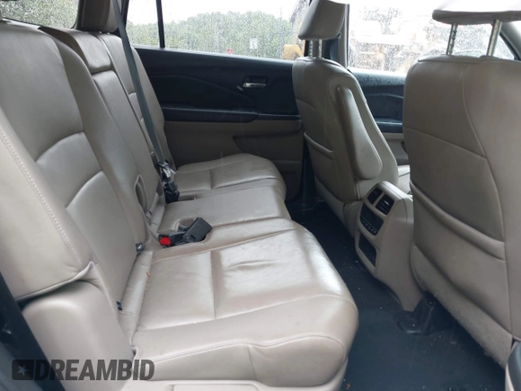 2016 Honda Pilot EX-L with VIN 5FNYF6H5XGB007876, listed as a IAAI auction lot 42366901 with 128,580 mi miles and . Bid and sale history available at DreamBid. Image 8.