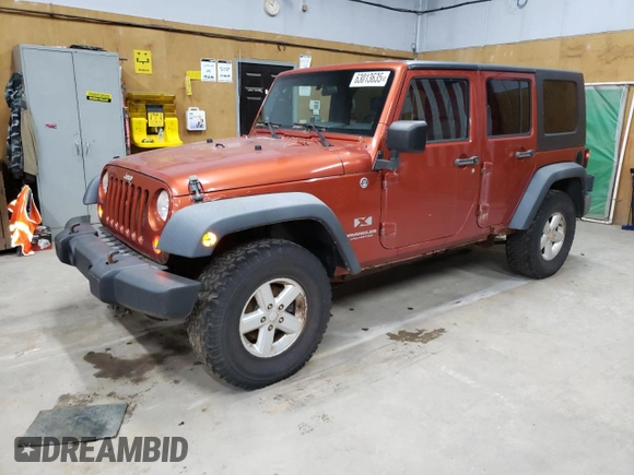 2009 Jeep Wrangler Unlimited X с VIN 1J8GA39139L788480, выставлен на аукционе Copart как лот 63013635 с пробегом 166 007 миль миль и Чистый • Clean title. История ставок и продаж доступна на DreamBid. Изображение 1.