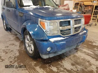2007 Dodge Nitro SLT with VIN 1D8GU58KX7W614584, listed as a IAAI auction lot 41036412 with 177,523 mi miles. Bid and sale history available at carsss.com. Image 6.