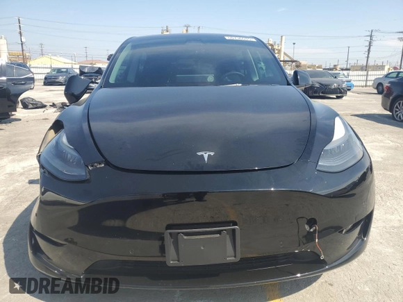 2022 Tesla Model Y Performance with VIN 7SAYGDEF6NF524171, listed as a Copart auction lot 60736945 with 30,629 mi miles and Salvage title. Bid and sale history available at DreamBid. Image 5.