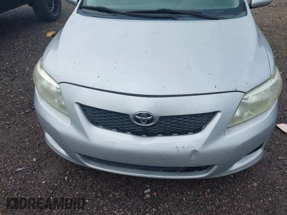 2010 Toyota Corolla with VIN 2T1BU4EE4AC512103, listed as a IAAI auction lot 42184988 with 142,954 mi miles and . Bid and sale history available at DreamBid. Image 6.