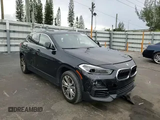2018 BMW X2 sDrive28i with VIN WBXYJ3C34JEJ91176, listed as a Copart auction lot 63418365 with 62,586 mi miles and Salvage title. Bid and sale history available at DreamBid. Image 14.
