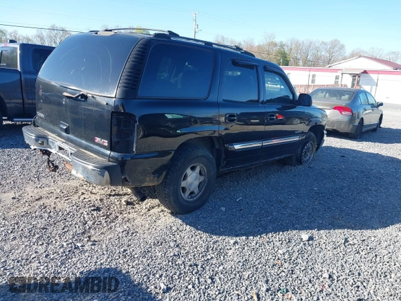 2004 GMC Yukon SLT with VIN 1GKEK13Z34R136256, listed as a IAAI auction lot 42122862 with 263,607 mi miles. Bid and sale history available at carsss.com. Image 4.