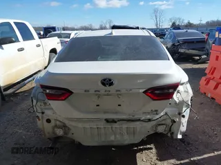 2022 Toyota Camry Hybrid LE with VIN 4T1C31AK7NU588937, listed as a IAAI auction lot 41401438 with 50,361 mi miles and . Bid and sale history available at carsss.com. Image 17.