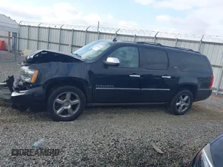 2014 Chevrolet Suburban LTZ with VIN 1GNSCKE05ER105566, listed as a IAAI auction lot 40762562 with 191,055 mi miles and . Bid and sale history available at DreamBid. Image 14.