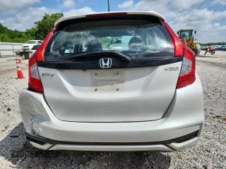 2019 Honda Fit LX с VIN 3HGGK5H48KM726963, выставлен на аукционе Copart как лот 61465025 с пробегом 97 129 миль миль и Списание • Salvage title. История ставок и продаж доступна на DreamBid. Изображение 6.