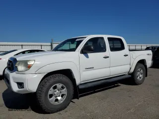 2013 Toyota Tacoma with VIN 5TFLU4EN6DX067292, listed as a Copart auction lot 63462095 with 179,422 mi miles and Salvage title. Bid and sale history available at DreamBid. Image 1.