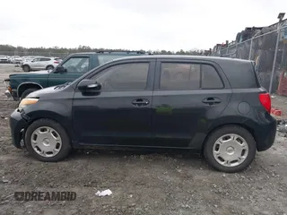 2010 Scion xD with VIN JTKKU4B45AJ058839, listed as a IAAI auction lot 41708936 with 214,685 mi miles. Bid and sale history available at carsss.com. Image 14.