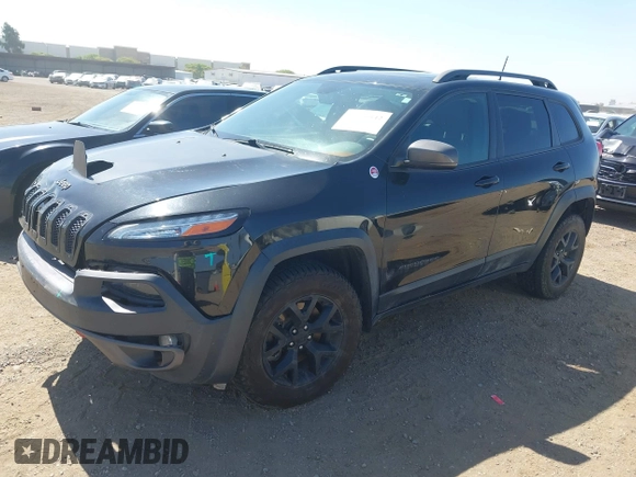 2016 Jeep Cherokee Trailhawk with VIN 1C4PJMBB9GW179051, listed as a IAAI auction lot 42520342 with 100,538 mi miles and . Bid and sale history available at DreamBid. Image 17.