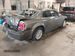 2010 Chrysler 300 Touring with VIN 2C3CA5CV9AH101800, listed as a IAAI auction lot 42015640 with 128,457 mi miles and . Bid and sale history available at DreamBid. Image 4.