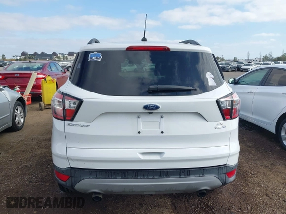 2017 Ford Escape SE with VIN 1FMCU9GD3HUD95726, listed as a IAAI auction lot 42121586 with 96,048 mi miles. Bid and sale history available at carsss.com. Image 16.