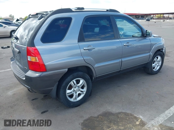 2005 Kia Sportage LX with VIN KNDJE723257122055, listed as a IAAI auction lot 42192102 with 167,726 mi miles and . Bid and sale history available at carsss.com. Image 4.