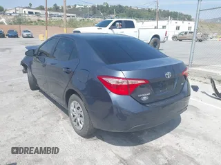 2019 Toyota Corolla L z VIN 2T1BURHE4KC215942, wystawiony jako IAAI lot #42104097 z przebiegiem 87 020 mil mil oraz . Historia ofert i sprzedaży dostępna na DreamBid. Obrazek 3.
