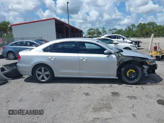 2015 Volkswagen Passat 1.8T Limited Edition with VIN 1VWAT7A35FC109653, listed as a IAAI auction lot 41917568 with 118,912 mi miles. Bid and sale history available at carsss.com. Image 13.