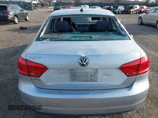 2014 Volkswagen Passat S w/Nav with VIN 1VWAP7A39EC016279, listed as a IAAI auction lot 41792113 with 189,833 mi miles. Bid and sale history available at carsss.com. Image 6.