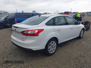 2012 Ford Focus SE with VIN 1FAHP3F21CL201889, listed as a IAAI auction lot 42070260 with 126,650 mi miles. Bid and sale history available at carsss.com. Image 4.