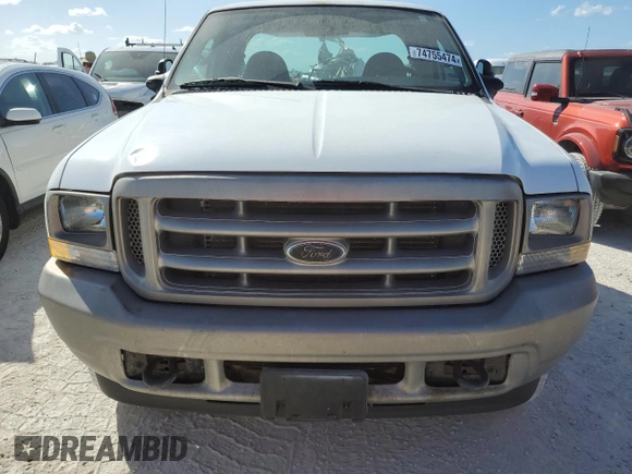 2004 Ford F-250 XL with VIN 1FTNX21L74ED07583, listed as a Copart auction lot 74755474 with 227,029 mi miles and Salvage Title. Bid and sale history available at DreamBid. Image 5.