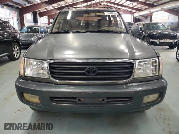 2000 Toyota Land Cruiser with VIN JT3HT05J1Y0098192, listed as a Copart auction lot 77380554 with 203,436 mi miles and Clean Title. Bid and sale history available at carsss.com. Image 5.