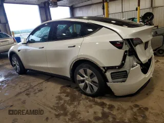 2022 Tesla Model Y Long Range z VIN 7SAYGDEEXNA012904, wystawiony jako Copart lot #57492865 z przebiegiem 31 294 mil mil oraz Szkody całkowita. Historia ofert i sprzedaży dostępna na DreamBid. Obrazek 2.