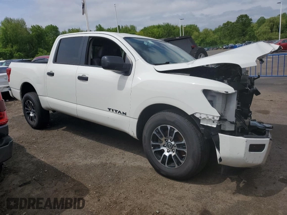 2023 Nissan Titan SV с VIN 1N6AA1EE2PN111512, выставлен на аукционе Copart как лот 57320295 с пробегом 38 921 миль миль и Списание • Salvage title. История ставок и продаж доступна на DreamBid. Изображение 4.