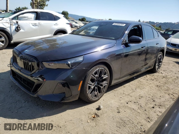 2024 BMW i5 eDrive40 with VIN WBY33FK03RCS14771, listed as a Copart auction lot 62393255 with 25,192 mi miles and Salvage title. Bid and sale history available at DreamBid. Image 1.