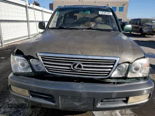 1999 Lexus LX 470 z VIN JT6HT00W0X0069481, wystawiony jako Copart lot #43588185 z przebiegiem 297 554 mil mil oraz Szkoda całkowita • Salvage title. Historia ofert i sprzedaży dostępna na DreamBid. Obrazek 5.
