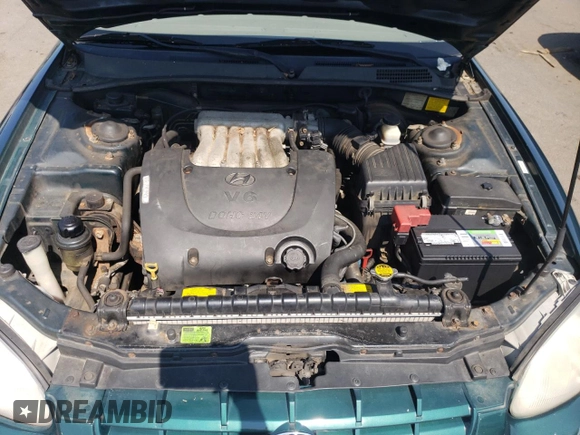 1999 Hyundai Sonata GLS with VIN KMHWF35V9XA100869, listed as a Copart auction lot 68219694 with 144,388 mi miles and Non Repairable. Bid and sale history available at carsss.com. Image 11.