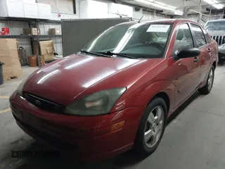 2003 Ford Focus SE z VIN 1FAFP34Z83W231672, wystawiony jako IAAI lot #42322702 z przebiegiem 173 625 mil mil oraz . Historia ofert i sprzedaży dostępna na DreamBid. Obrazek 17.