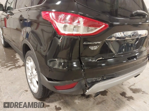 2014 Ford Escape Titanium with VIN 1FMCU9J95EUD85537, listed as a IAAI auction lot 41472236 with 154,796 mi miles. Bid and sale history available at carsss.com. Image 6.
