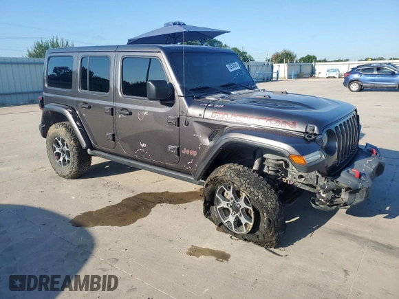 2018 Jeep Wrangler Unlimited Rubicon z VIN 1C4HJXFN3JW236121, wystawiony jako Copart lot #60930565 z przebiegiem 128 727 mil mil oraz Szkoda całkowita • Salvage title. Historia ofert i sprzedaży dostępna na DreamBid. Obrazek 4.