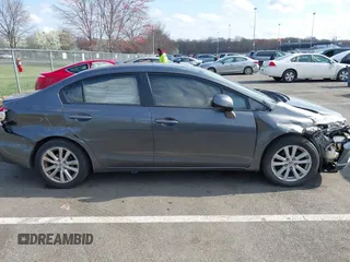 2012 Honda Civic EX-L with VIN 2HGFB2F94CH307646, listed as a IAAI auction lot 42006923 with 260,917 mi miles and . Bid and sale history available at DreamBid. Image 13.